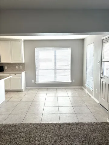 a view of kitchen and microwave