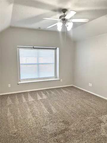 a kitchen with stainless steel appliances a sink and a refrigerator
