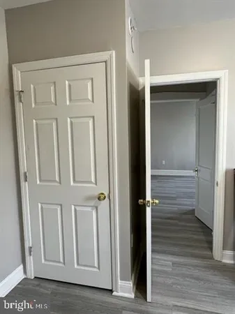 a view of entryway with wooden floor