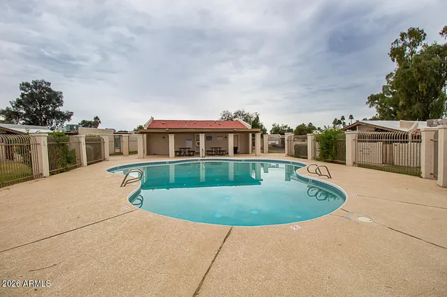 a view of a house with a swimming pool