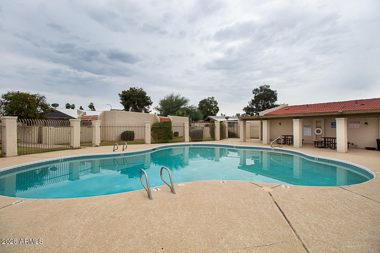 555 North May, Unit 3 Mesa, AZ 85201 - Photo 26 of 26 a view of a house with a swimming pool