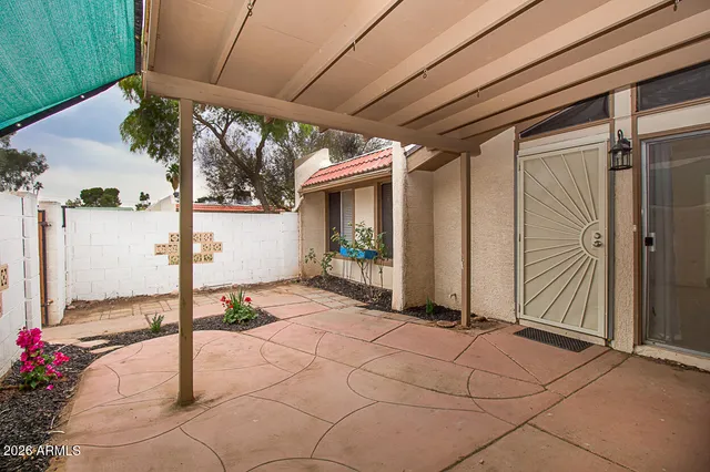 a view of a porch with furniture