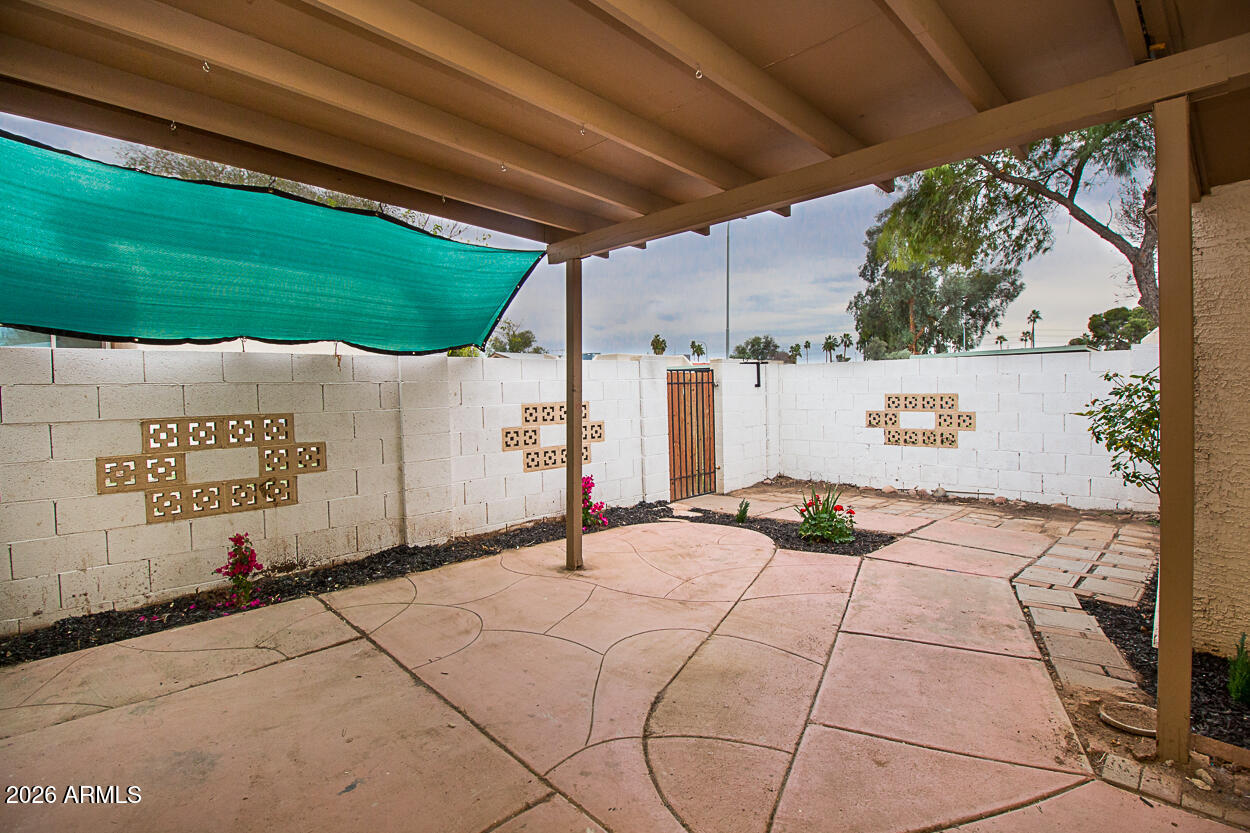 555 North May, Unit 3 Mesa, AZ 85201 - Photo 4 of 26 a view of a street with a big yard
