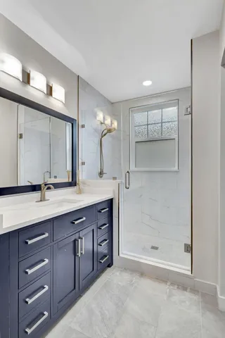 a view of a livingroom with wooden floor and entryway