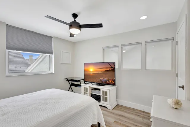 a bathroom with a double vanity sink mirror toilet bathtub and shower