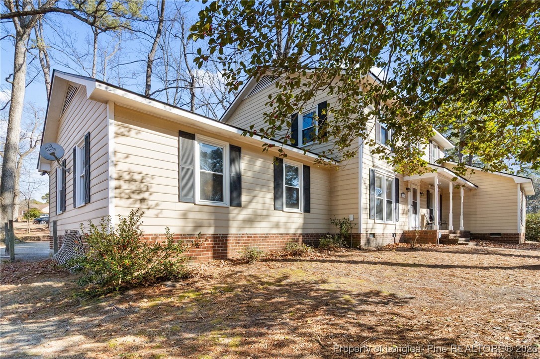 2924 Walden Road Fayetteville, NC 28303 - Photo 3 of 44 a front view of a house with a yard