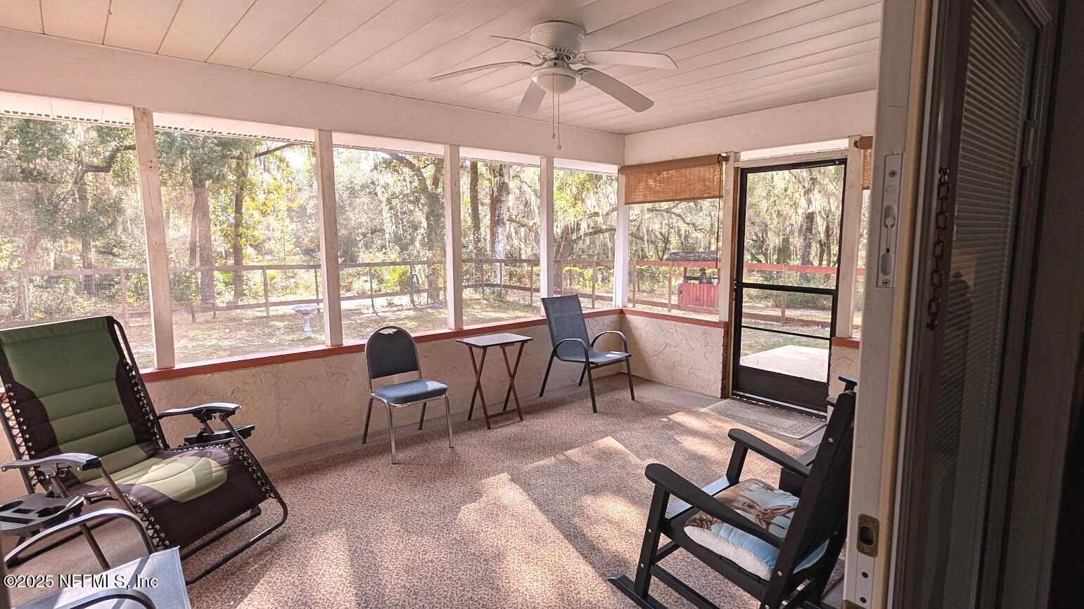 137 Tallow Road Pomona Park, FL 32181 - Photo 39 of 47 a living room with furniture and a window
