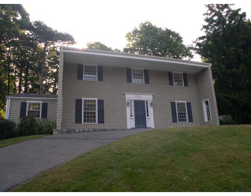 1 Bradlee Road Marblehead, MA 01945 - Photo 1 of 1 a front view of a house with a garden