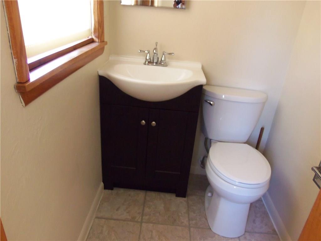 1235 North Main St Extension Butler, PA 16001 - Photo 12 of 22 New Master Bath - all new sink/vanity, fixtures, high-level commode, flooring