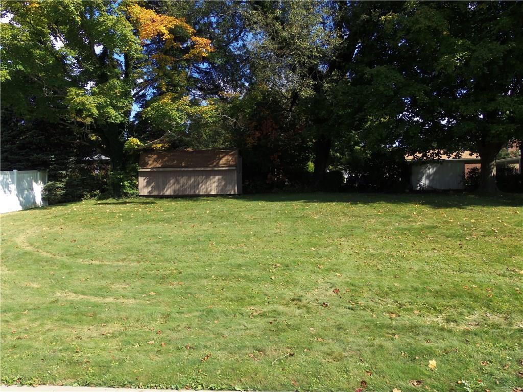 1235 North Main St Extension Butler, PA 16001 - Photo 21 of 22 Large private, usable back yard - two sides bordered by fencing, and back by shed, trees and other greenery