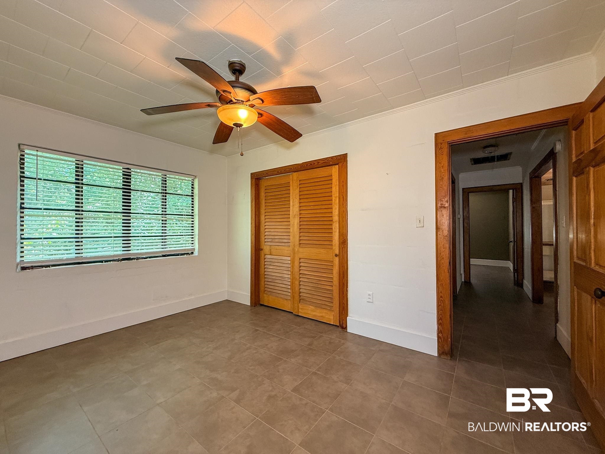 18711 Keller Road Foley, AL 36535 - Photo 22 of 38 Room featuring tile flooring and white walls