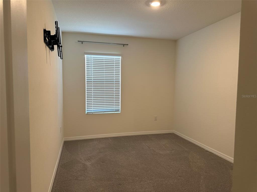 33762 Jasmine Star Loop Wesley Chapel, FL 33543 - Photo 13 of 27 an empty room with a window