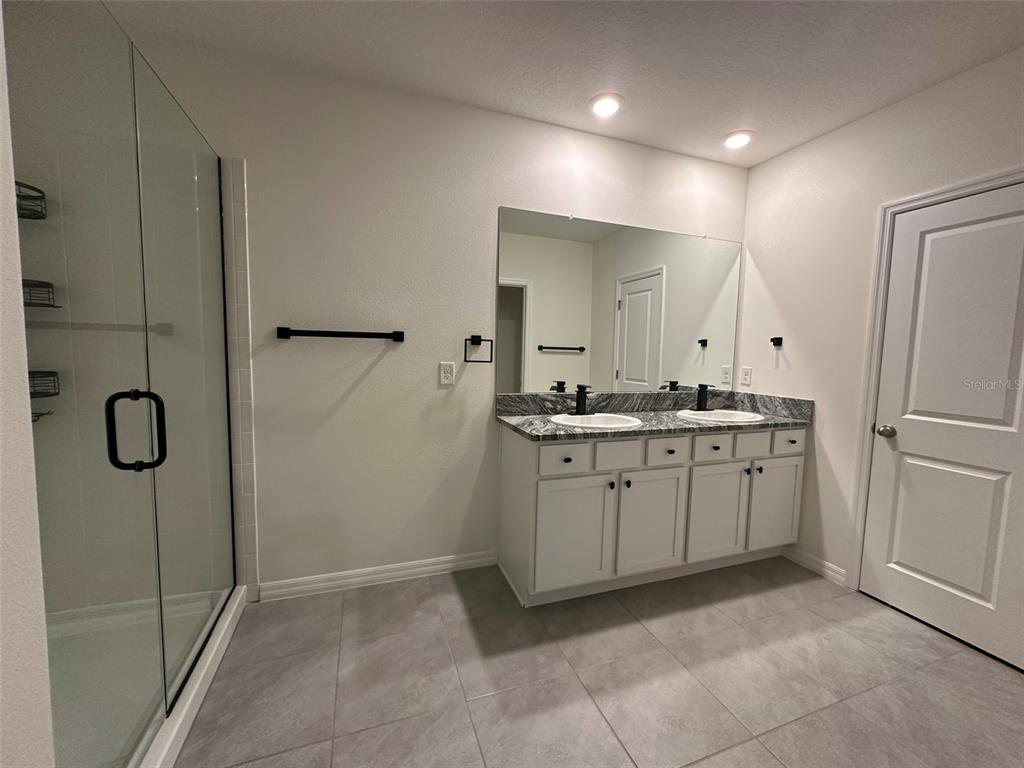 33762 Jasmine Star Loop Wesley Chapel, FL 33543 - Photo 20 of 27 a room with a washer and dryer