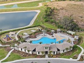33762 Jasmine Star Loop Wesley Chapel, FL 33543 - Photo 26 of 27 an aerial view of a house with a ocean view