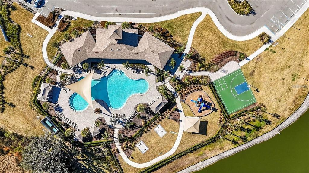 33762 Jasmine Star Loop Wesley Chapel, FL 33543 - Photo 27 of 27 an aerial view of a highlighted house