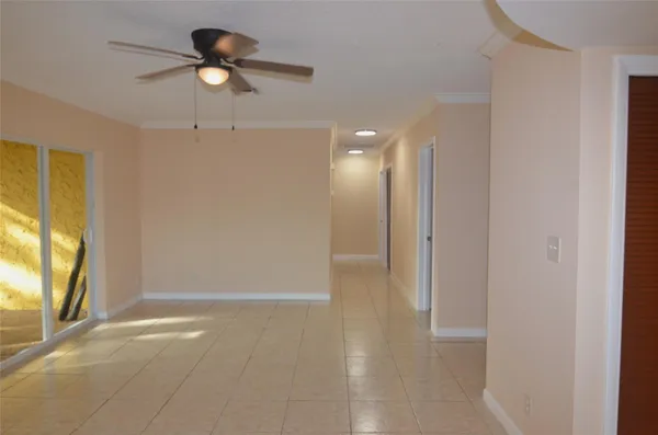 a view of an empty room and window