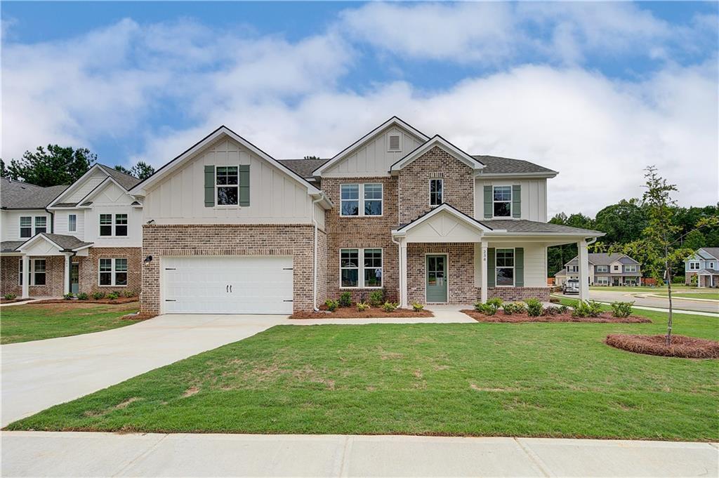 270 Linford Drive Locust Grove, GA 30248 - Photo 1 of 45 a front view of a house with a yard porch and a fire pit
