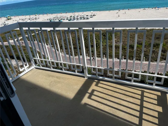 a view of a balcony with a large window