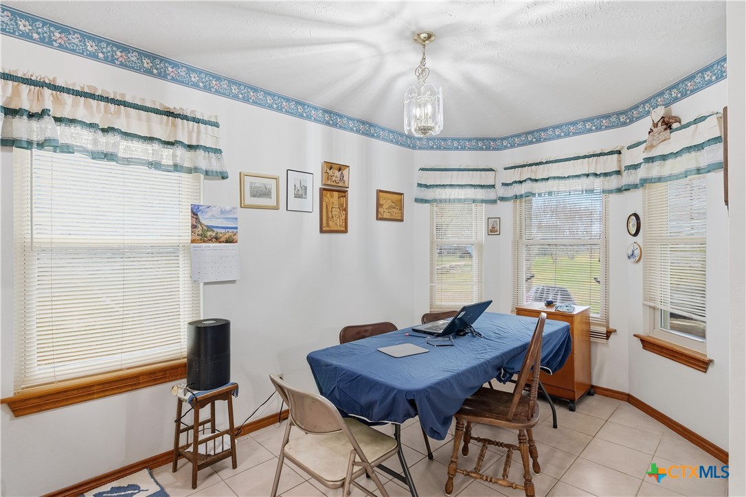 127 Santa Fe Ridge Seguin, TX 78155 - Photo 11 of 31 a view of a workspace with furniture window and wooden floor