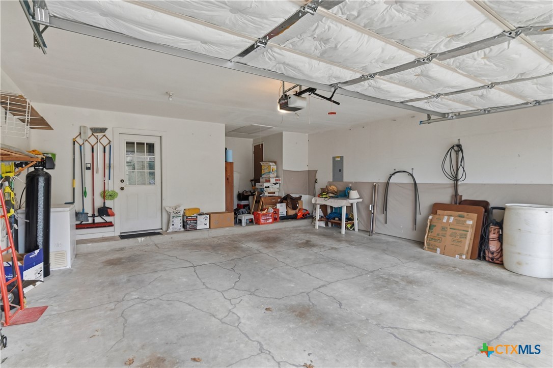 127 Santa Fe Ridge Seguin, TX 78155 - Photo 19 of 31 a view of a storage & utility room with two chairs