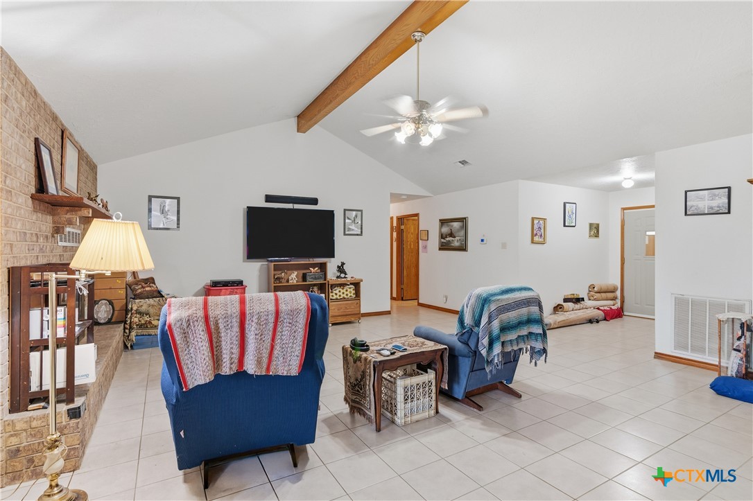 127 Santa Fe Ridge Seguin, TX 78155 - Photo 8 of 31 a living room with furniture and a flat screen tv