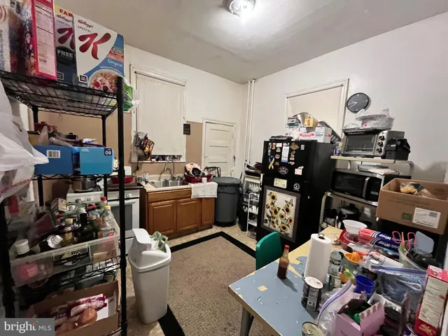 a view of a workspace with furniture and toys