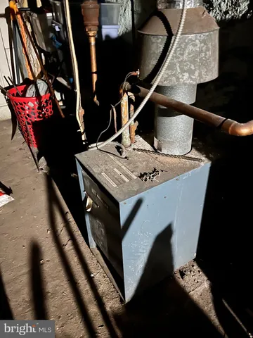 a living room with furniture and flowers