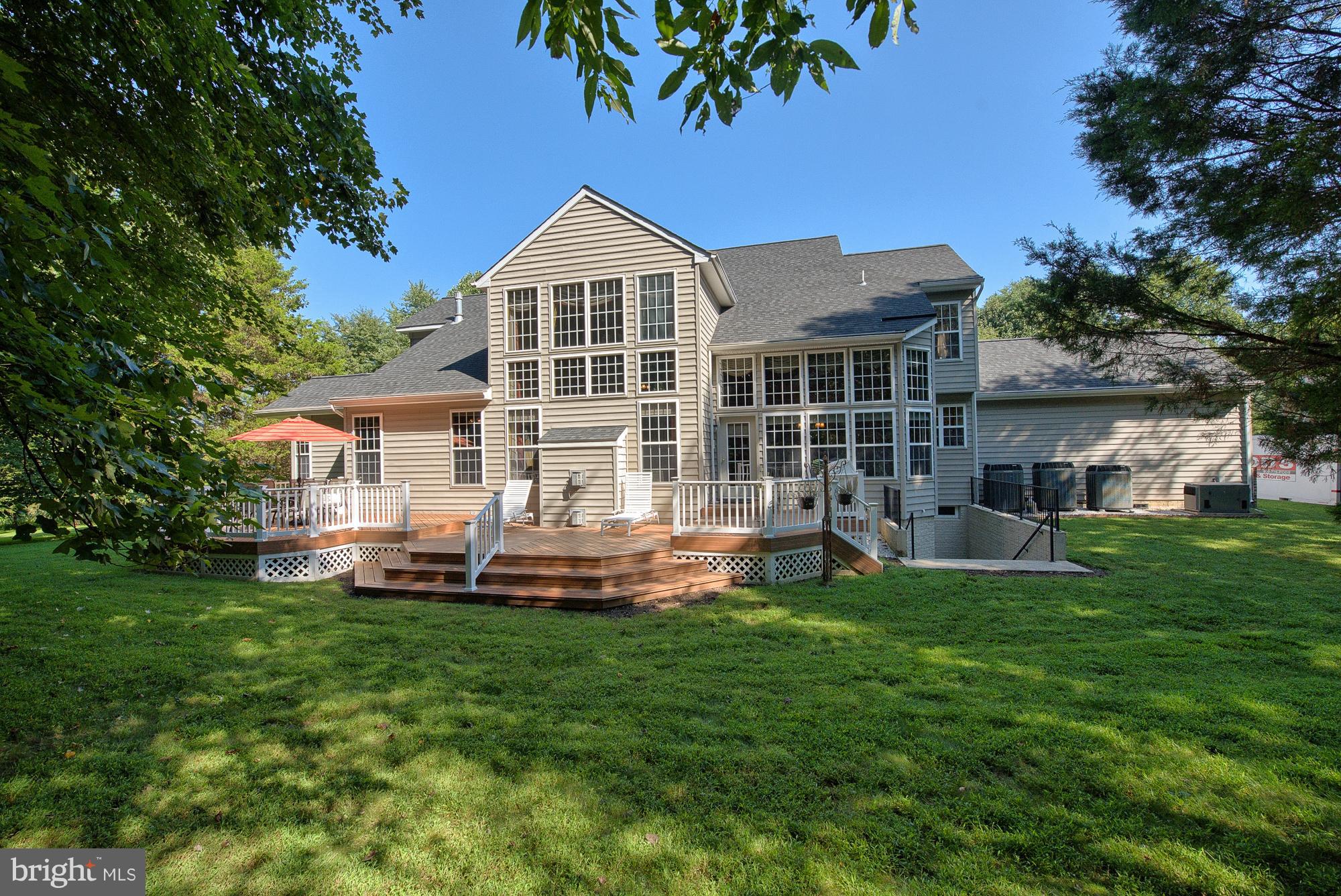 8306 Brink Road Laytonsville, MD 20882 - Photo 3 of 30 Private backyard with huge deck and gorgeous views
