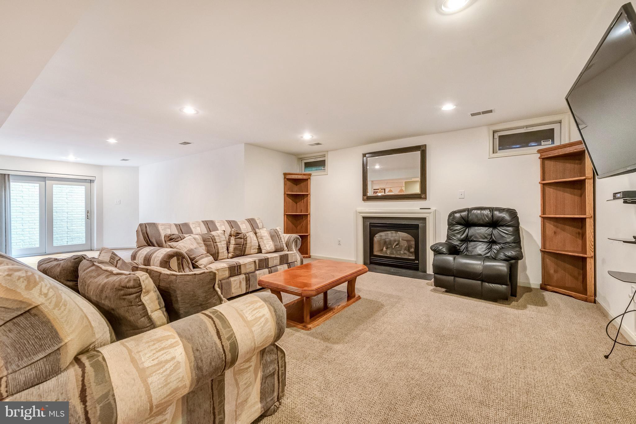 8306 Brink Road Laytonsville, MD 20882 - Photo 26 of 30 Finished basement with walkout