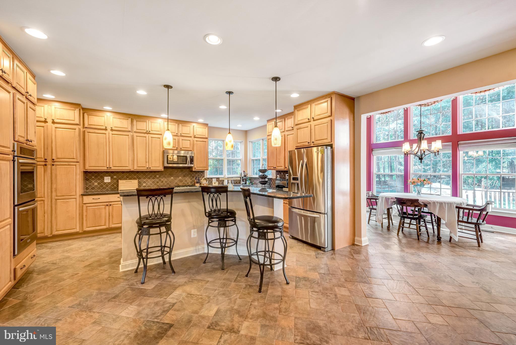 8306 Brink Road Laytonsville, MD 20882 - Photo 6 of 30 Updated kitchen and sunroom