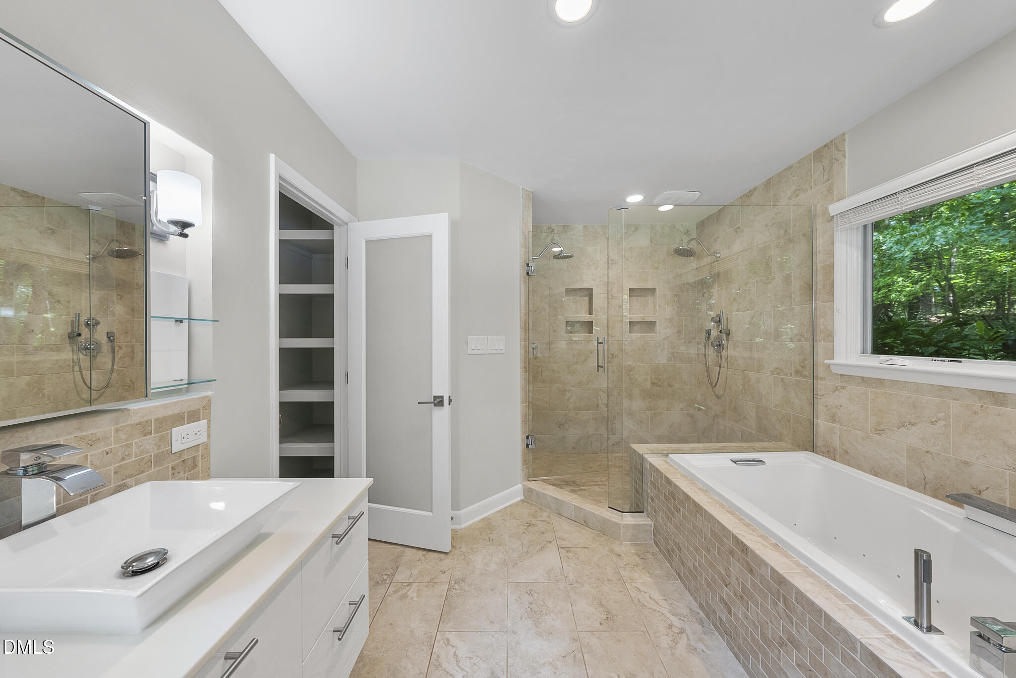 1605 Ridge Road Raleigh, NC 27607 - Photo 32 of 34 a bathroom with a tub sink shower and a mirror
