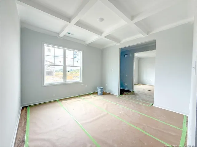 a bathroom with a toilet and a sink