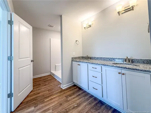 a bathroom with a sink and toilet