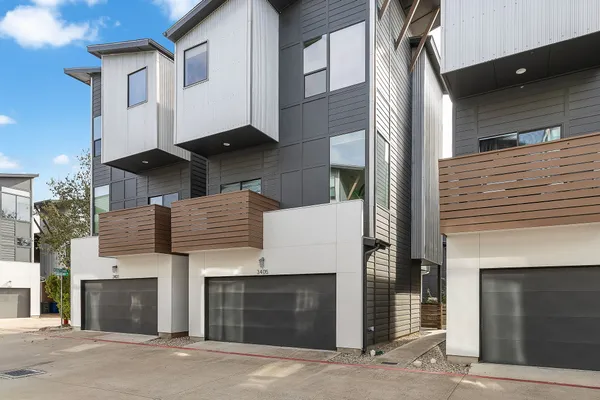 a front view of a building with garage