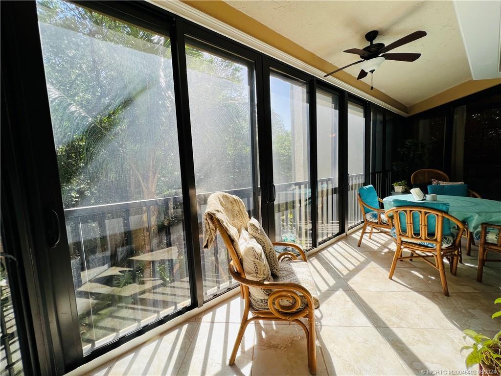 221 Northeast Plantation Road, Unit 215 Stuart, FL 34996 - Photo 56 of 83 a balcony with furniture and view of balcony