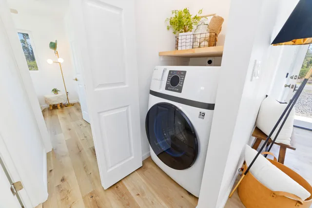 a view of a room with washer and dryer