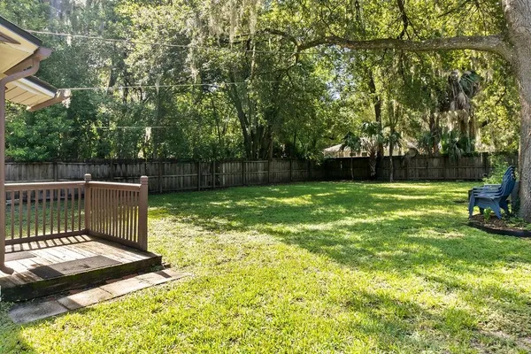 a view of a backyard with a small cabin
