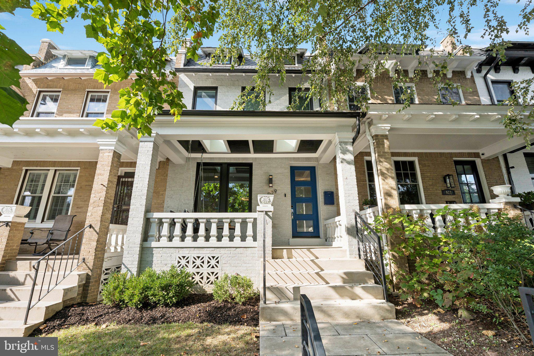929 Quincy Street Northwest Washington, DC 20011 - Photo 1 of 37 front view of a house with a small yard