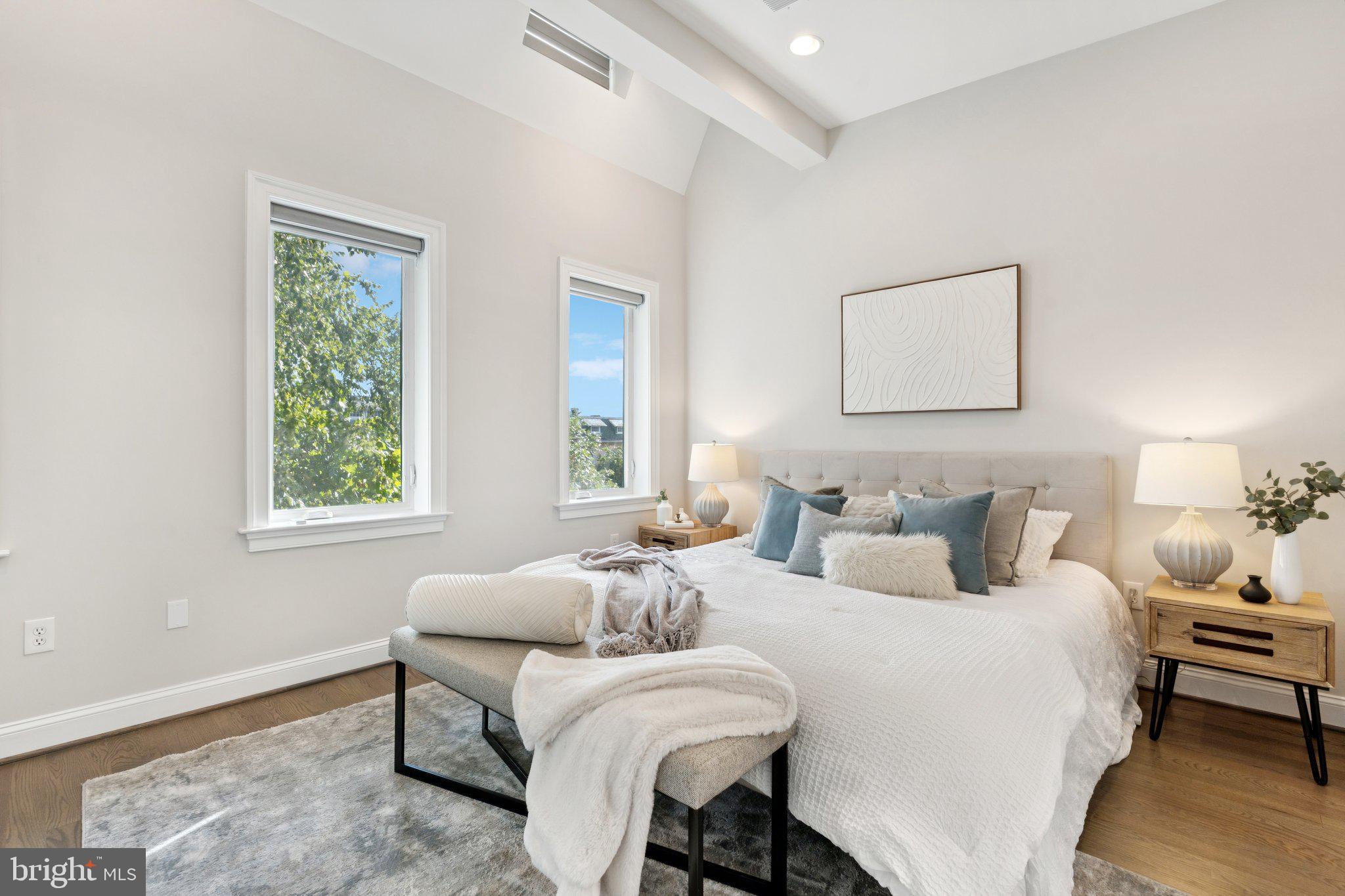 929 Quincy Street Northwest Washington, DC 20011 - Photo 17 of 37 a bedroom with two beds and a window
