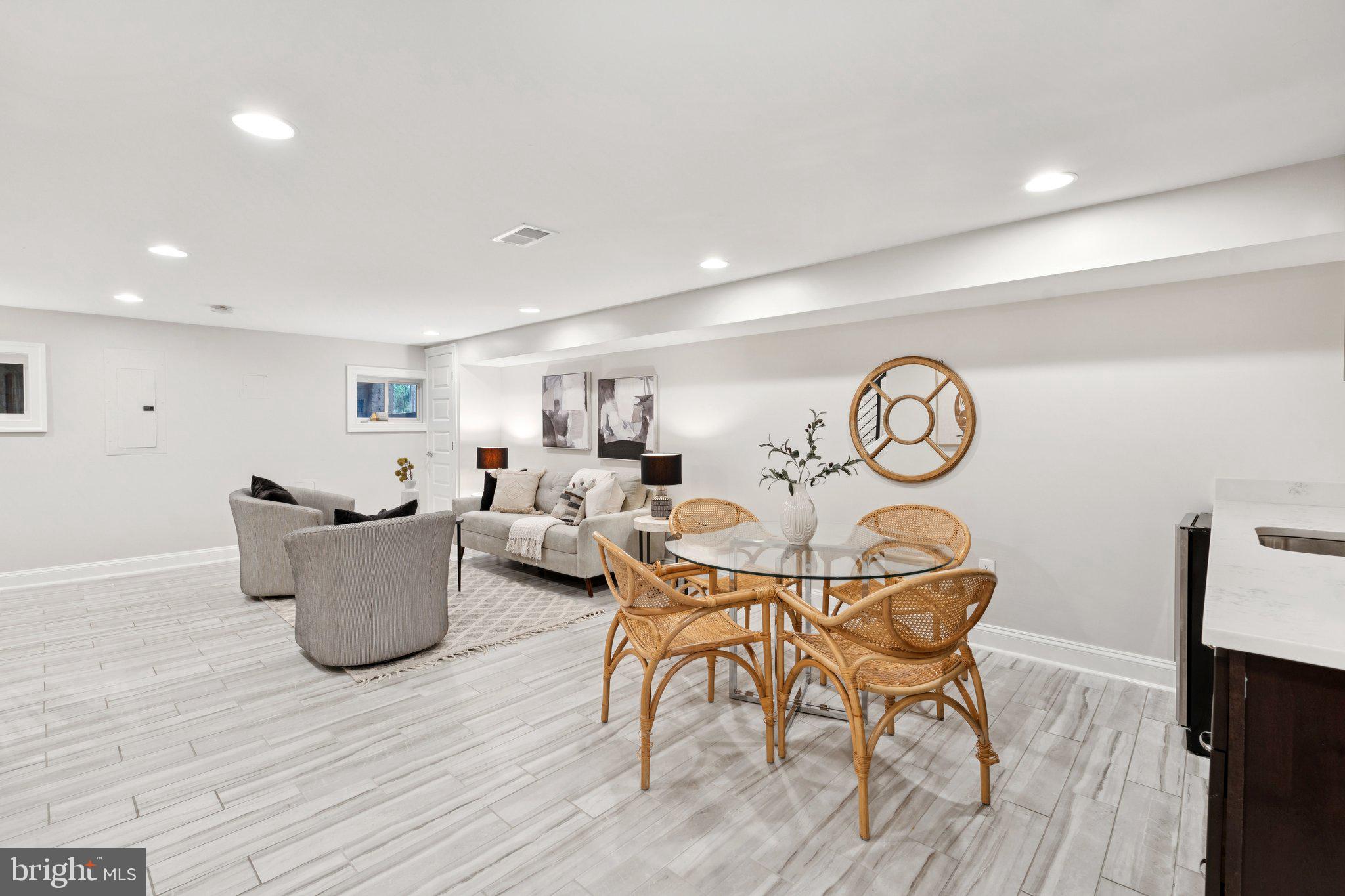 929 Quincy Street Northwest Washington, DC 20011 - Photo 26 of 37 a living room with furniture and a wooden floor