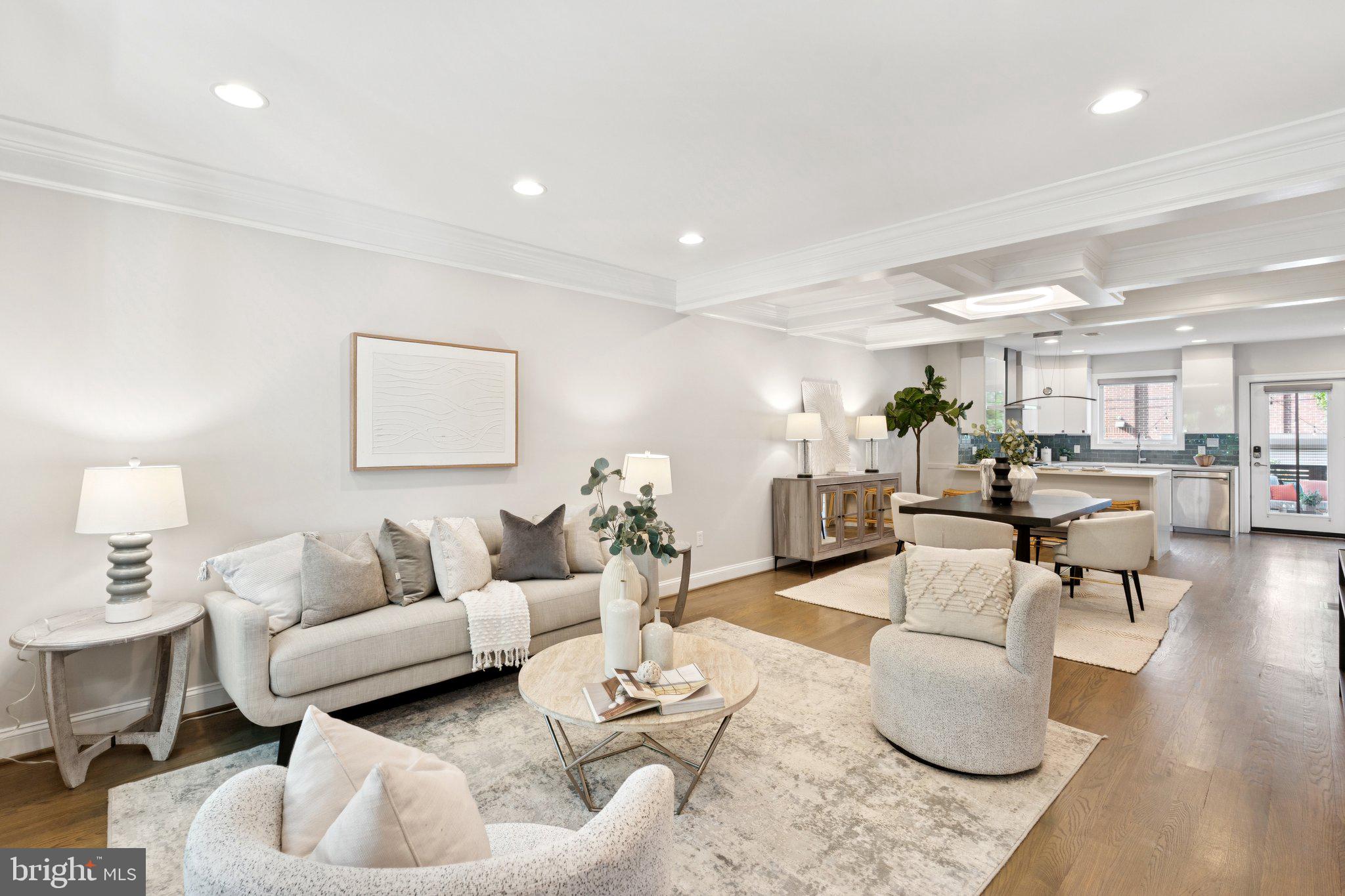 929 Quincy Street Northwest Washington, DC 20011 - Photo 6 of 37 a living room with furniture and a wooden floor