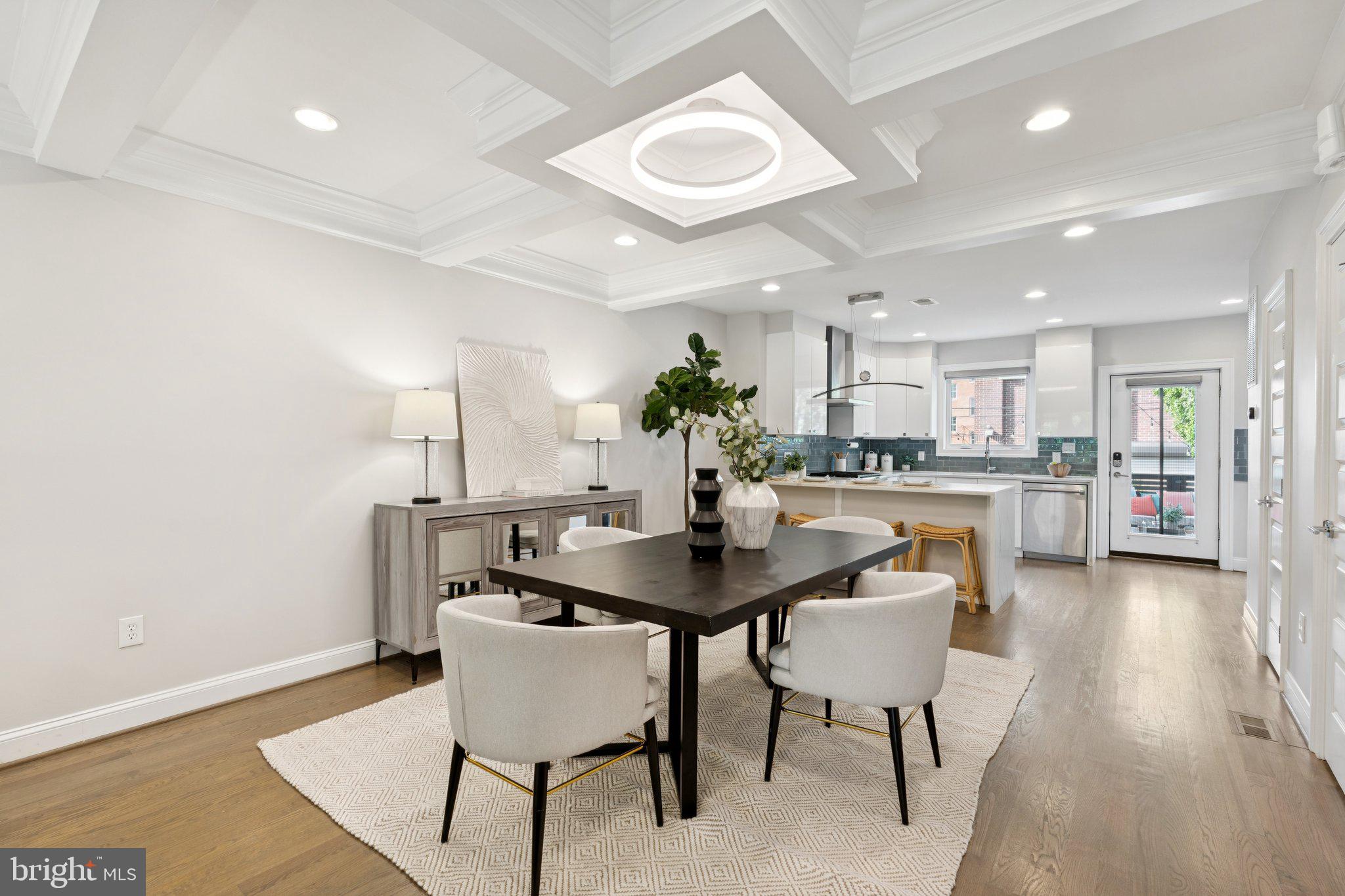 929 Quincy Street Northwest Washington, DC 20011 - Photo 7 of 37 a view of a dining room with furniture and wooden floor