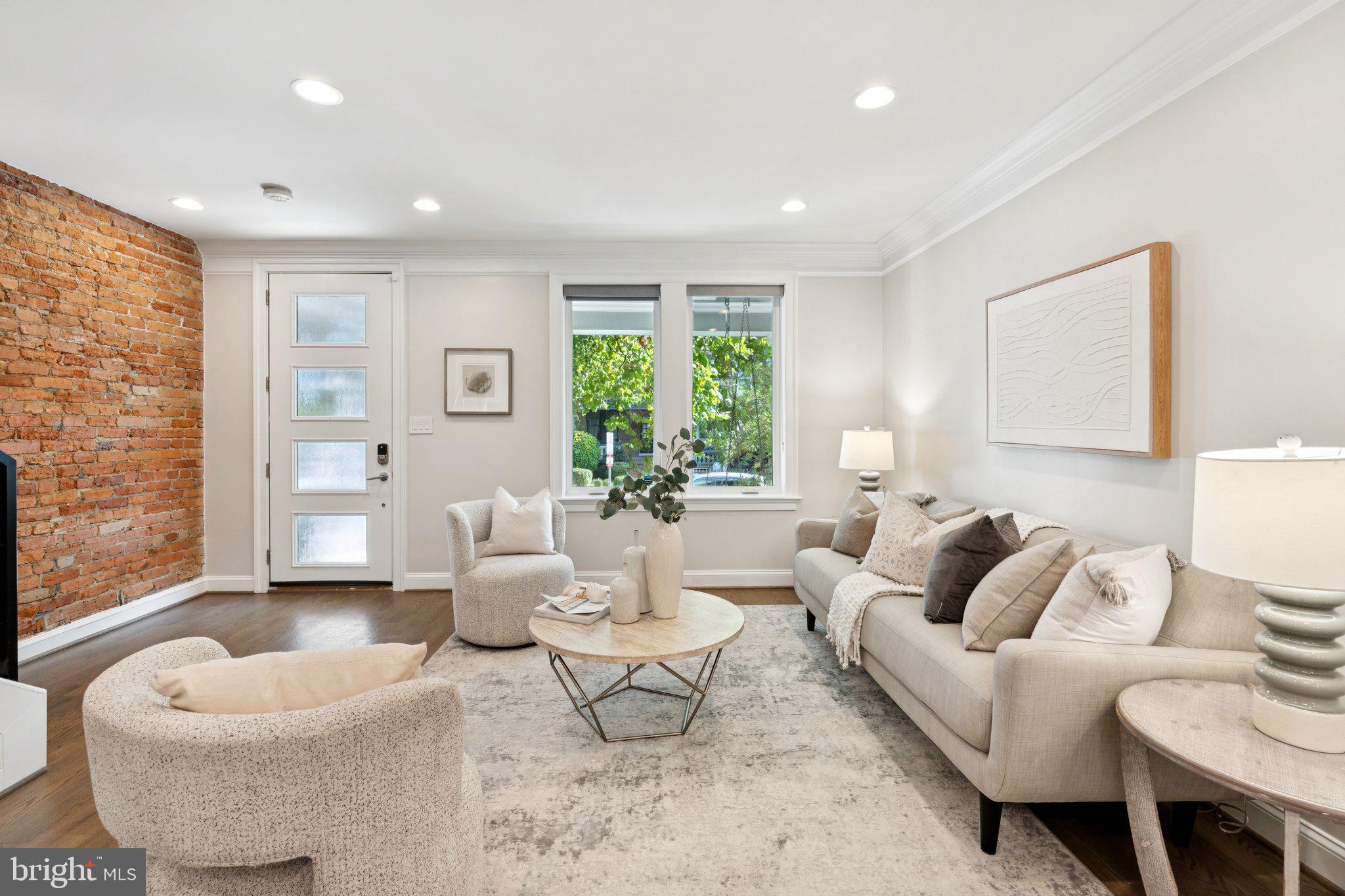 929 Quincy Street Northwest Washington, DC 20011 - Photo 8 of 37 a living room with furniture and a large window