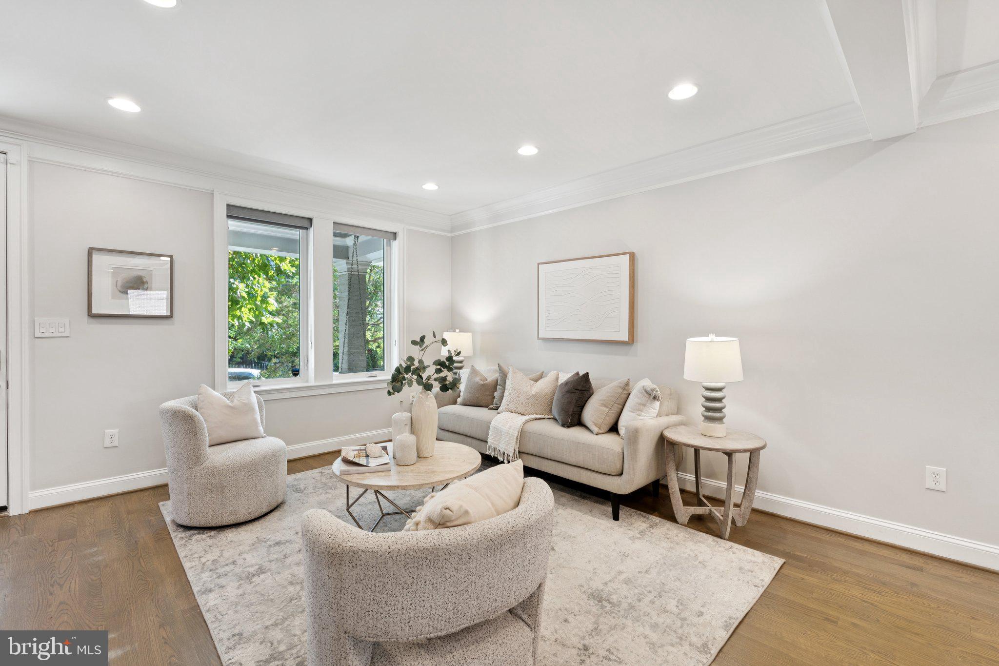 929 Quincy Street Northwest Washington, DC 20011 - Photo 9 of 37 a living room with furniture and a window