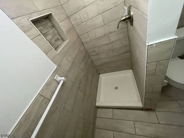 a bathroom with a sink and toilet