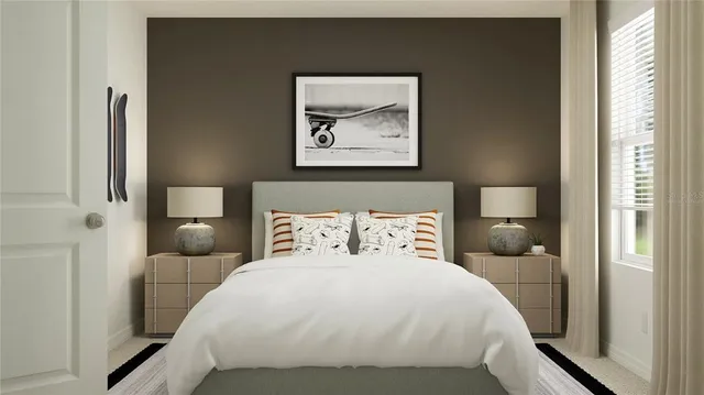 a bedroom with a bed and glass window