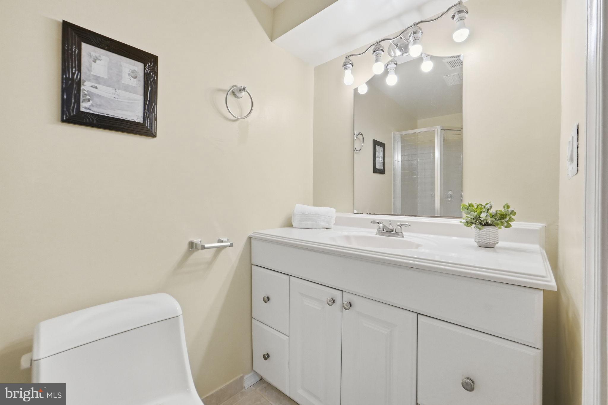 6470 Franconia Court Springfield, VA 22150 - Photo 24 of 31 a bathroom with a sink and a toilet
