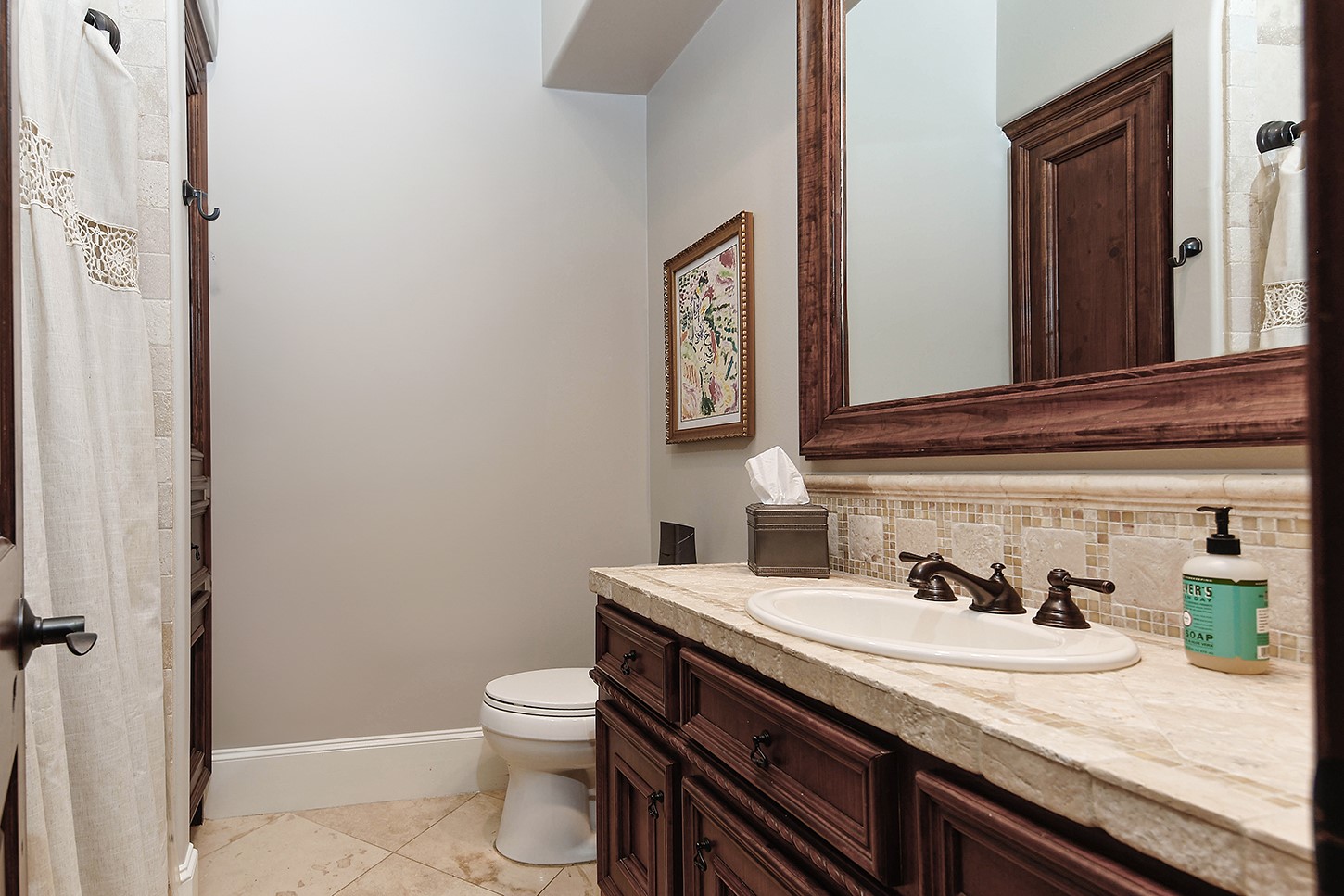 119 Angel Leaf Road The Woodlands, TX 77380 - Photo 36 of 50 a bathroom with a granite countertop sink a toilet and a mirror