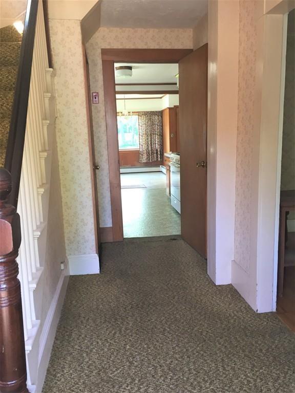 7 Argilla Road Ipswich, MA 01938 - Photo 6 of 20 an entryway with wooden floor and a livingroom