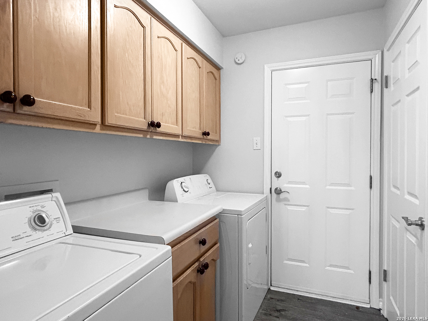 607 Topaz Avenue Seguin, TX 78155 - Photo 11 of 23 a utility room with dryer and washer